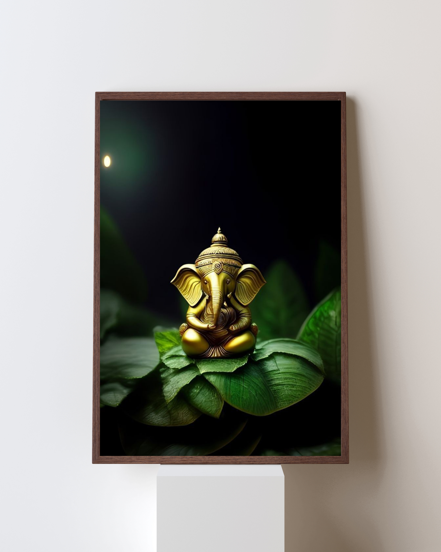Golden Serenity – Lord Ganesha on Green Leaves Wall Frame